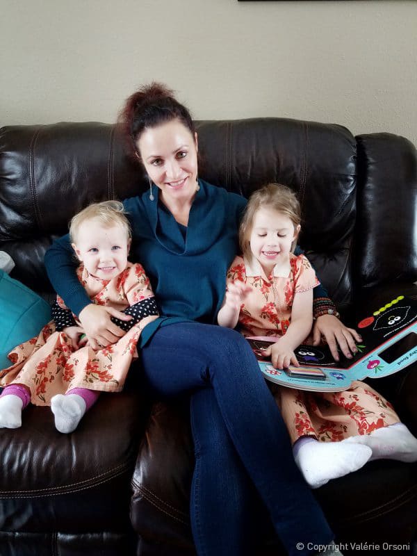 Valerie Orsoni reading with Hutterite children