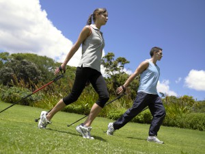 Side profile of a young couple exercising